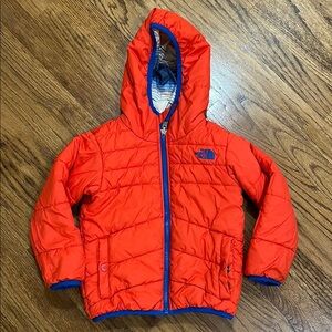 The North Face Vibrant Orange Jacket with Blue Trim